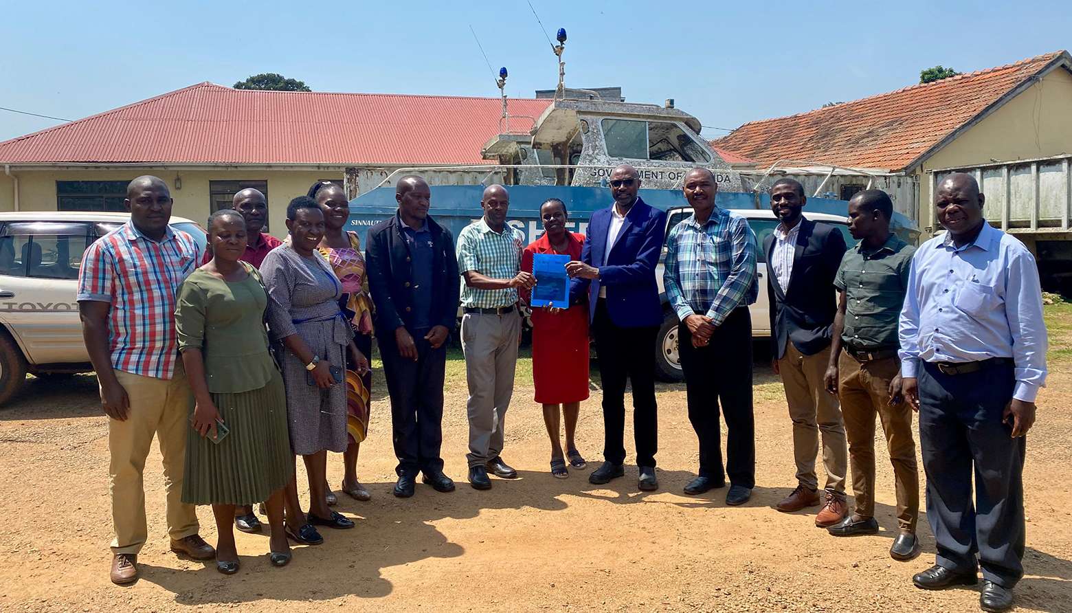 District Fisheries Officers from Masaka, Mukono, Buikwe and Jinja pose for a photo with Cinnamon Solutions team at the hand over of baseline report at MAIF